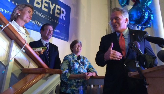 Gov. Terry McAuliffe congratulates former Lt. Gov. Don Beyer on his victory in the Democratic primary. 