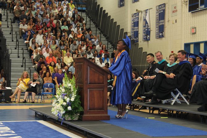 Senior Josephine Kihiu delivers the ceremony’s Honor Graduate Address. 