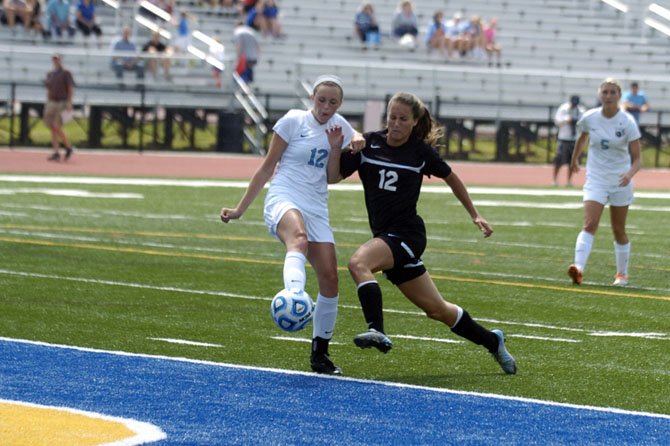 Centreville senior Jenna Green, right, scored two goals against Cosby in the 6A state semifinals on June 14.