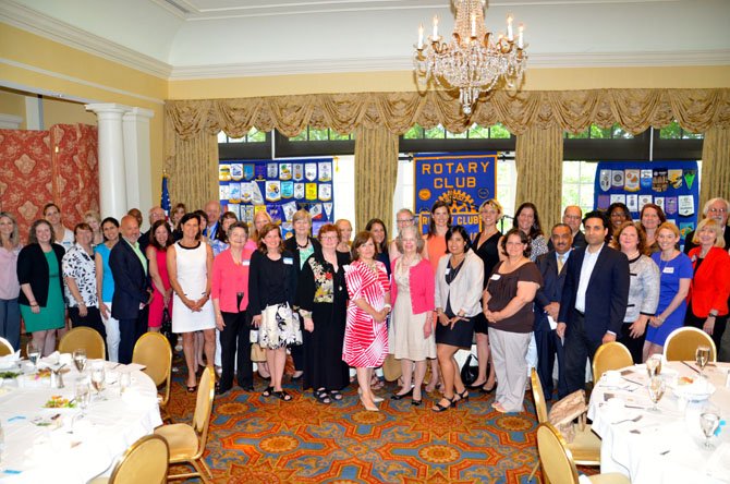 Representatives from local nonprofits gather for a group photo June 17 at the Rotary Club of Alexandria's annual Contributions Day luncheon at Belle Haven Country Club. The club awarded more than $90,000 to 32 local organizations.
