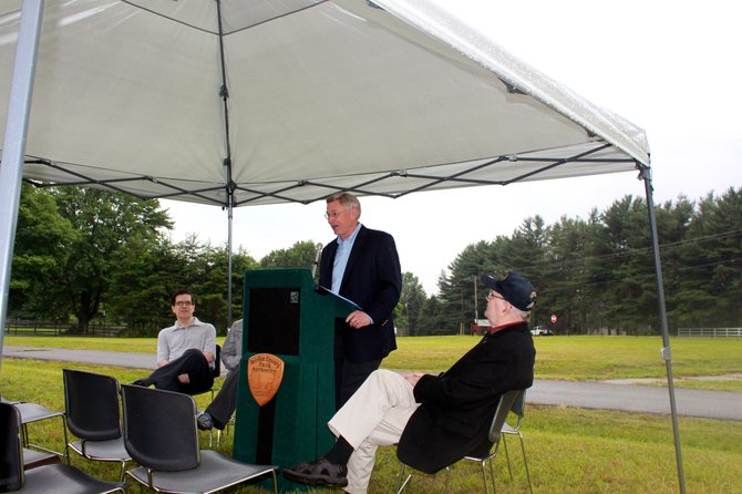 Dranesville Supervisor John Foust speaks before the roll-top observatory groundbreaking Saturday.