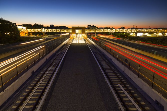 Exterior of Wiehle-Reston East Station at night looking west.