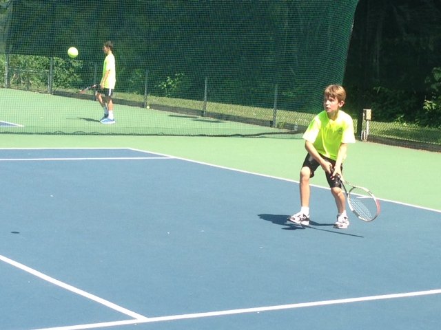 Jacob Kohlmayer, 11, of Chesterbrook Elementary and the Chesterbrook Tennis Team supplies his best backhand shot in a match against Sudley Tennis Club on July 2.