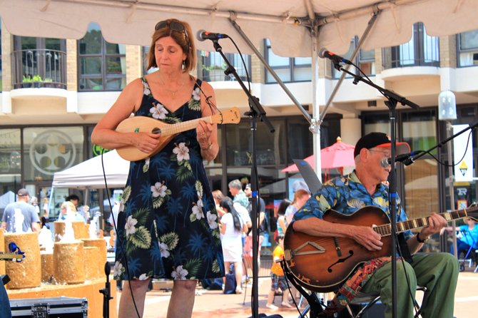 Kathy and Merv from Rockville during their set at the Lake Anne Ukulele Festival Saturday.