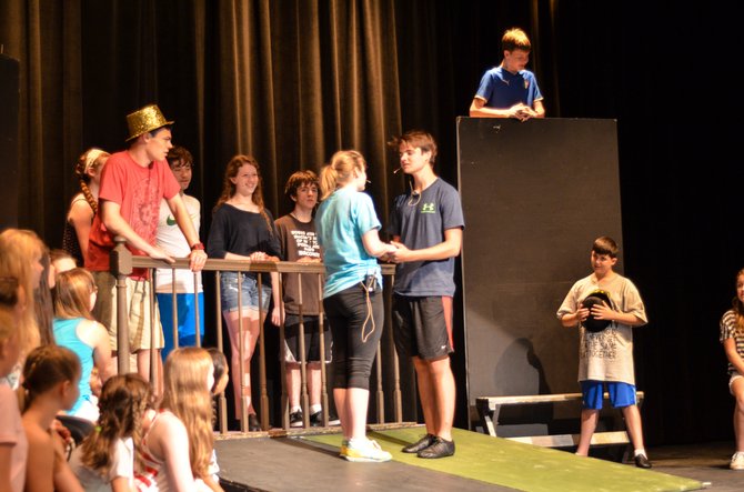 Cast rehearse the court room scene for the August production of ‘Hello Dolly!’ at Herndon High auditorium. The production has a cast of over 50 persons not including the musicians and tech crews.