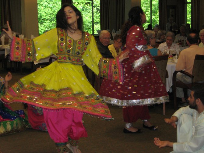 Dining staff members at Greenspring shared their cultural roots by entertaining residents with traditional international dance and music. 