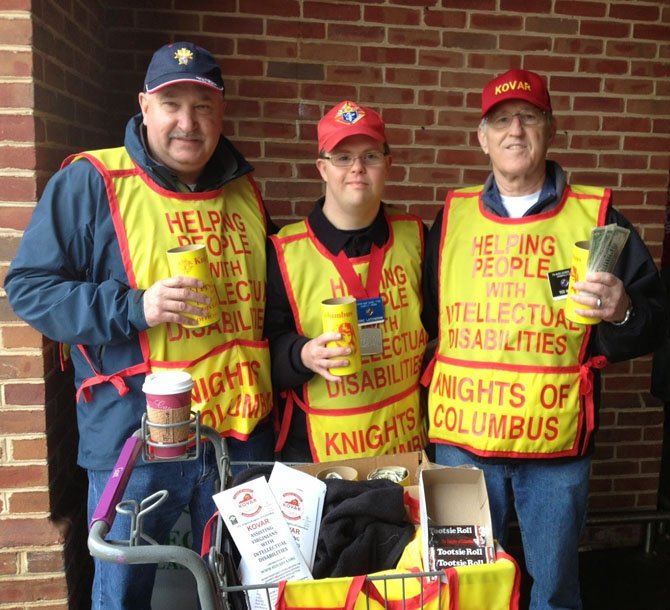 Eric Latcheran (in center) collecting donations for KOVAR charities with two fellow Knights.
