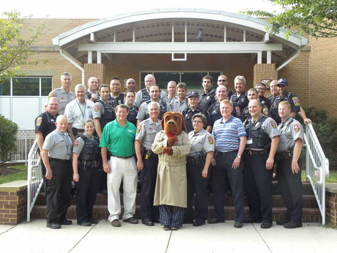 Fairfax County Police Officers, McGruff the Crime Dog, and Supervisors John C. Cook (R- Braddock) and Pat Herrity (R-Springfield) visit Fairfax County neighborhoods, Tuesday, Aug. 5, for National Night Out.