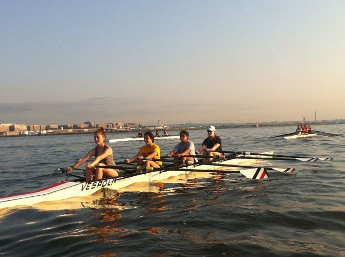 <cl>The quads line up for their 500 sprint to show off their sculling skills at the Blue Plains Sprints on Aug. 2.
