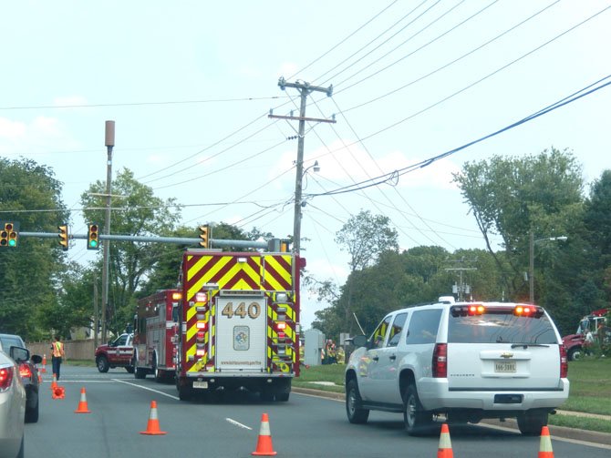 Fire and Rescue vehicles line Chain Bridge Road, last Thursday afternoon, as traffic is merged into one lane.