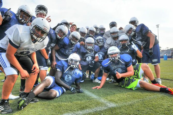 The Washington-Lee football team is a confident group after winning the 2013 National District title.