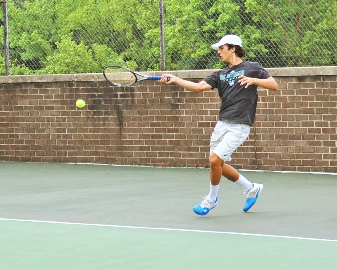 Josh Hublitz hits a forehand on one of the outdoor hard courts at Jack Schore Tennis, which operates out of Regency in McLean.