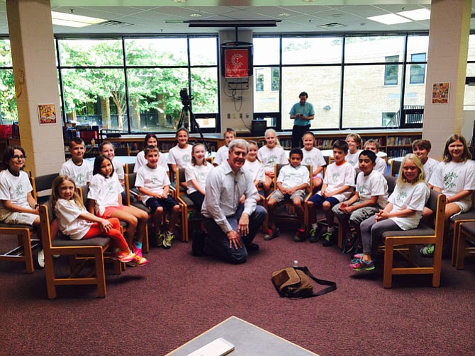 Steve Sasson, the inventor of the digital camera, poses for a photo with participants of Camp Invention held Aug. 7 at Fort Hunt Elementary School. Sponsored by the U.S. Patent and Trade Office and the National Inventors Hall of Fame, Camp Invention is a nationwide program focusing on STEM skills, creativity and innovation.