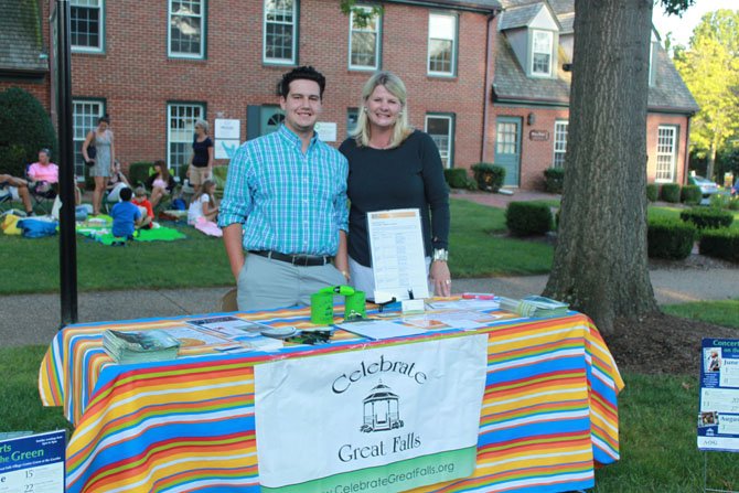 Celebrate Great Falls intern Mike Stys and director Erin Lobato at the information booth during the Concerts on the Green Sunday.