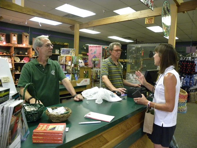 Owner Steve Pyne discusses products and services with Kathy Morris at The Wild Bird Center of Burke.