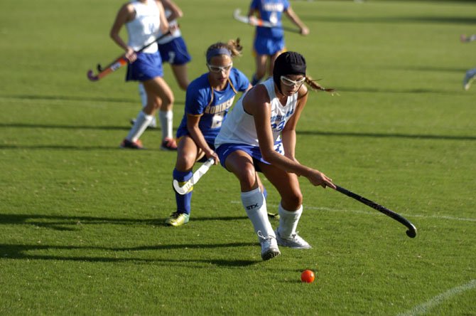 Megan Greatorex (23) and the South Lakes field hockey team lost to Robinson and beat Stuart during the Under the Lights tournament on Monday at Lee High School.