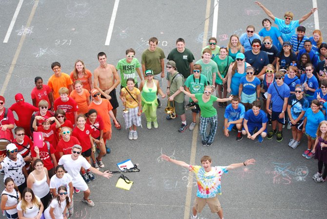 The Marching Band students wear their favorite color. To continue tradition, the students made a rainbow.
