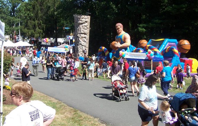 Burke Centre Festival-goers experienced plenty of sunshine in 2013. Organizer Jeanie Winslow and her staff are hoping for similar conditions this year.