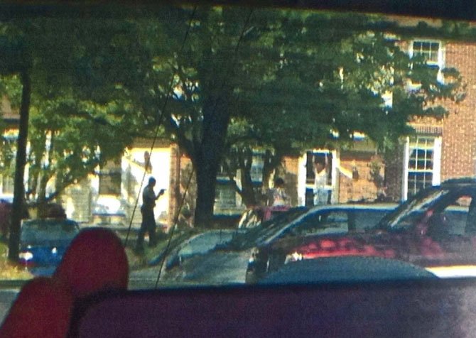 John Geer, standing in his doorway, minutes before he was shot by a Fairfax County Police officer.
