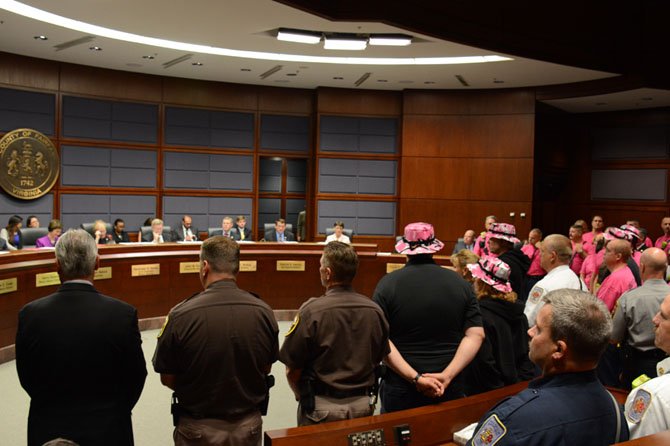 Representatives and supporters of the Guardians of the Ribbon, Pink Heals Tour gather to be recognized by the Board of Supervisors.
