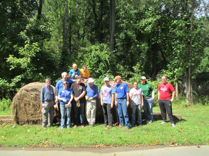 "Change the World Day" volunteers at the Claude Moore Farm on Sept. 7. 