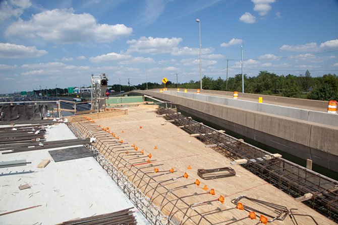 Looking north on the new ramp to the Fort Belvoir north area, the flyover bridge will be linked to the existing HOV ramp to allow commuters from the NGA building to access the southbound 95 Express Lanes in the afternoon, as well as the northbound I-95 general purpose lanes. This ramp will be open when the 95 Express Lanes open in early 2015.
