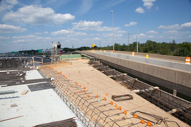 Looking north on the new ramp to the Fort Belvoir north area, the flyover bridge will be linked to the existing HOV ramp to allow commuters from the NGA building to access the southbound 95 Express Lanes in the afternoon, as well as the northbound I-95 general purpose lanes. This ramp will be open when the 95 Express Lanes open in early 2015.
