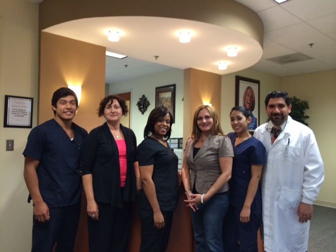 The Grace Dental team members are (from left): Junior Letona, Andria Gregory, Tomika Hill, Suzy Jarwa, Christie Palomino and Dr. Sam Jarwa.
