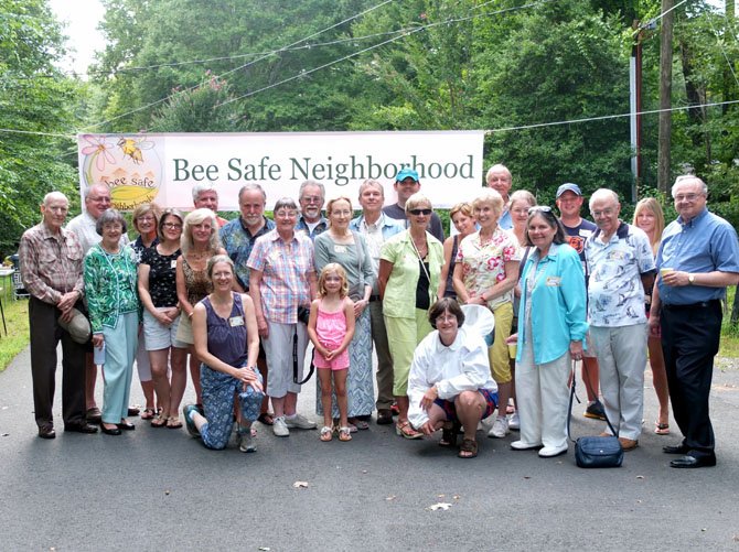Neighbors celebrate their new honeybee sanctuary.