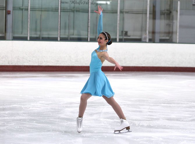 LaDan Nemati strikes her ending pose in her “Come Fly With Me” free ice dance.
