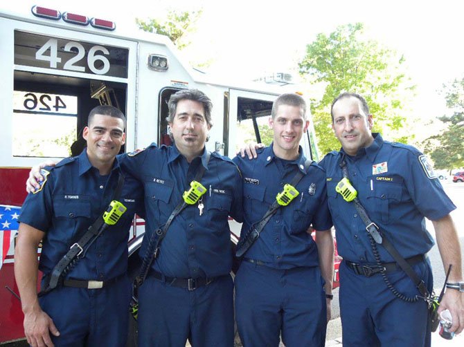 From left, firefighters Pete Torres, Dan Keyes, Dan Bridges and Capt. Ron Kuley, of Fire Station 426 in Edsall Road in Alexandria attend the Marvel Universe Live! event honoring firefighters and their families.
