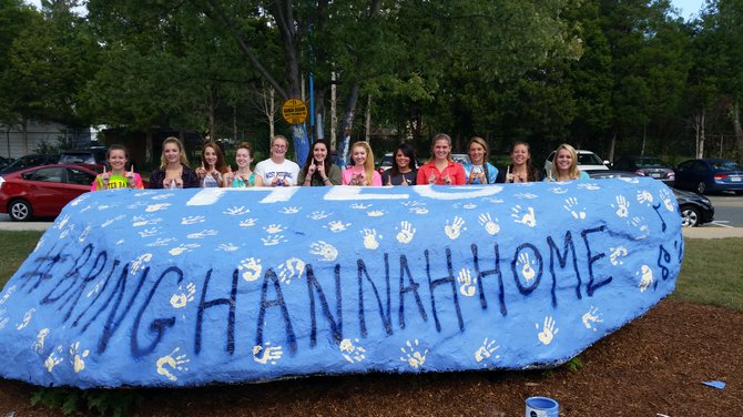 'Bring Hannah Home:' The West Potomac softball team painted the school rock for Hannah Graham.