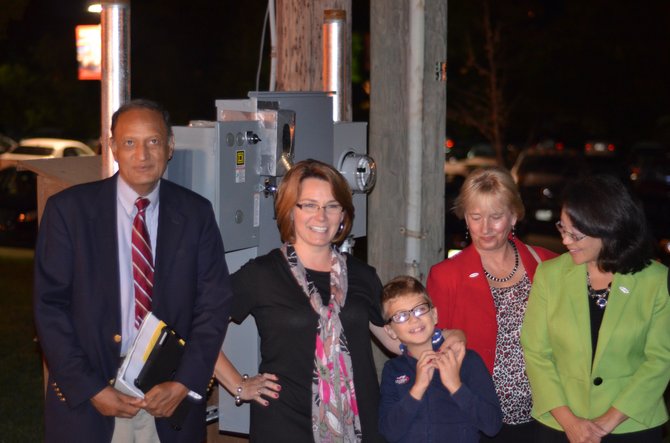 Herndon Town council member Jasbinder Singh, Herndon Mayor Lisa Merkel, Marc Anthony, and town council members Sheila Olem, and Grace Wolf.