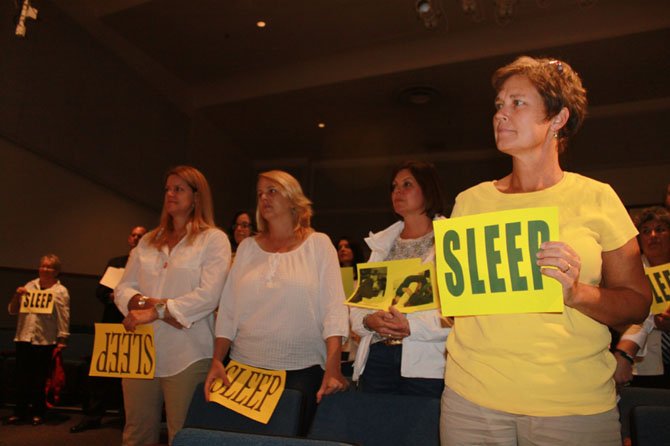 Supporters of later school start times at the Sept. 19 School Board meeting.