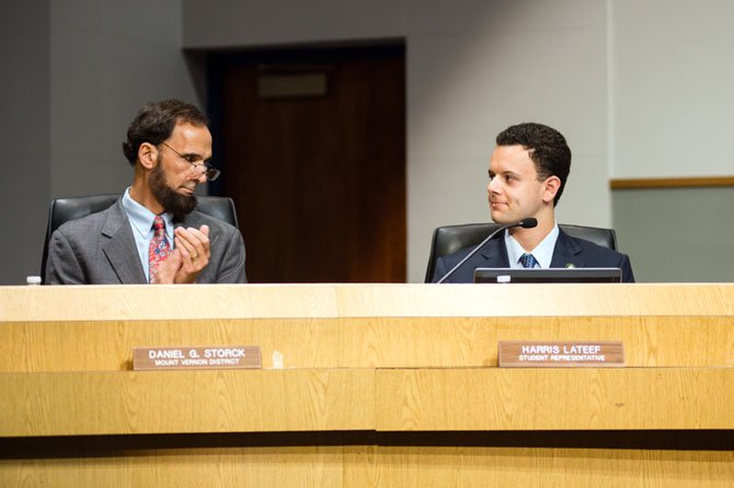 Mount Vernon District board member Daniel Storck and Student Representative Harris LaTeef at a school board meeting.
