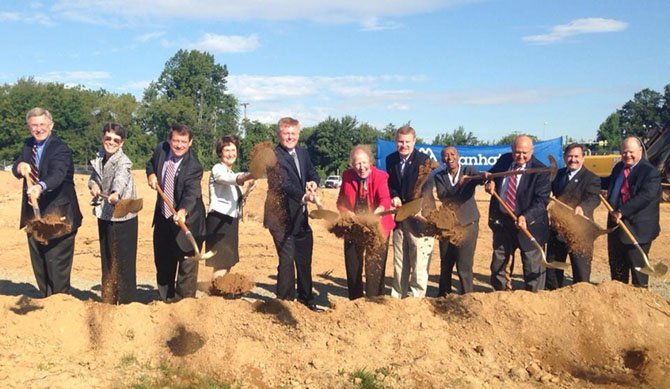 (From left) Supervisors John Faust, Linda Smyth, Pat Herrity, Chairman Sharon Bulova, John Cook, Penelope Gross, Jeff McKay, Catherine Hudgins, Gerry Hyland, Deputy County Executive of Public Safety Dave Rohrer and County Executive Ed Long.
