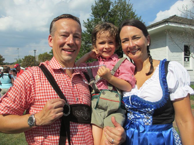 2013 Burgermeister Greg Bernhard reprises his role in the 2014 Vienna Oktoberfest. Joining the Burgermeister is Burgerfrau Robin Bernhard and “Burger-Boy” Gregor.
