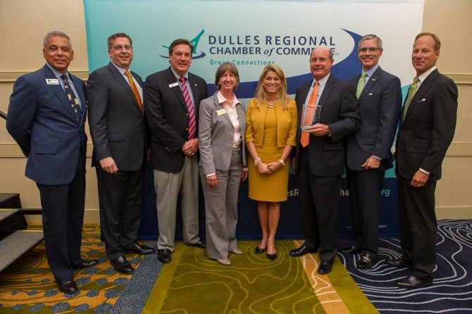 Area banking leaders attend the Dulles Regional Chamber’s annual industry luncheon. From left: Howard Pisons, president and CEO of the Community Bankers Bank, Jeff Dick, chairman, president and CEO of MainStreet Bank, Gary Shook, president and CEO of Middleburg Bank, Mary Gayle Holden, chairman of the Dulles Regional Chamber Board of Directors, Shaza Andersen, president and CEO of WashingtonFirst Bank, Dave Summers, chairman and CEO of Virginia Heritage Bank, Mike Fitzgerald, chairman, president and CEO of the Bank of Georgetown, and Mike Clarke, president and CEO of Access National Bank. 
