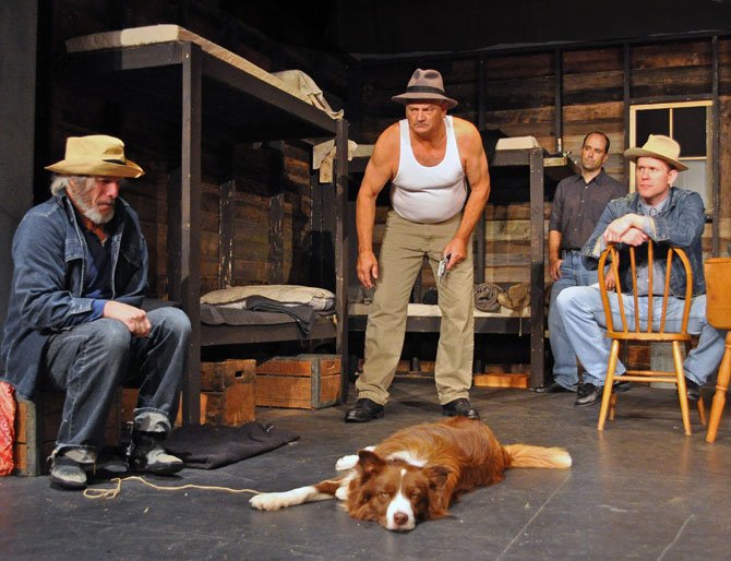 From left -- David James, Craig Geoffrion, Bobby Welsh and Ian Wade with Pagaan as Dog in rehearsal for the Providence Players production of “Of Mice and Men.”
