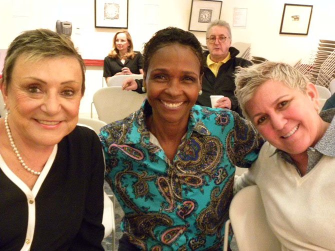 From left, Donna Mastran, Kristin Clark Taylor and Mary Caye Schirf, of Great Falls, attend the first Speaker’s Series lecture at Great Falls Library on Tuesday, Sept. 23.