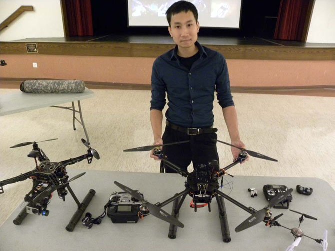 Roboticist Christopher Vo displays an array of drones during his lecture at Osher Lifelong Learning Institute at George Mason University on Wednesday, Sept. 24 in Burke.
