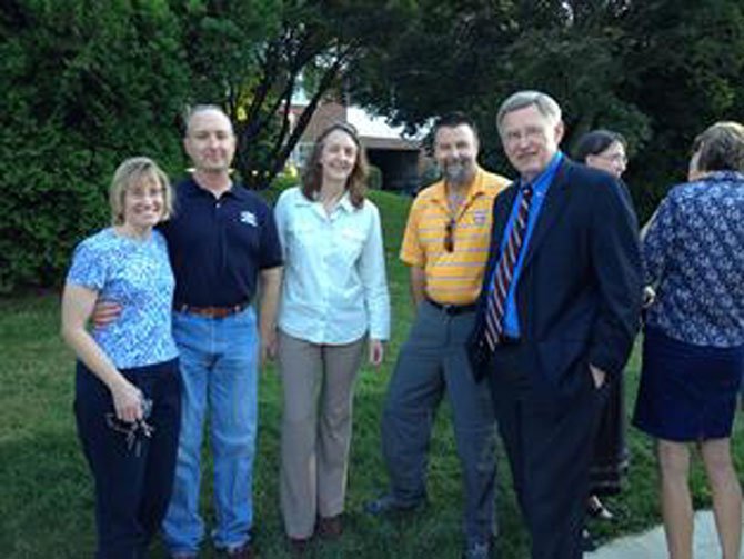 Sidewalk advocates Angela and Paul Keiser and Barb and Eric Malés join Supervisor Foust (D-Dranesville) at the event celebrating completion of a new sidewalk on Dead Run Drive. 