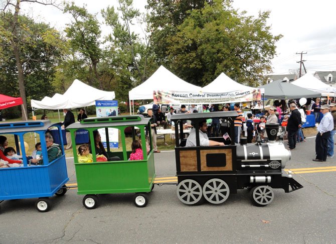 Children ride the trackless train through the Historic District. 