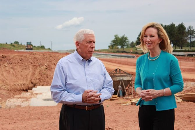 Republican candidate Barbara Comstock surveys a construction site in Loudoun County with longtime U.S. Rep. Frank Wolf (R-10) last spring. Wolf's retirement announcement paved the way for Comstock's congressional run.
