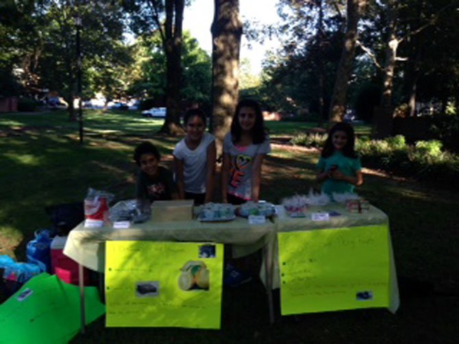Sami and Salma Saout, Selina and Jwana Al-Shihabi at their lemonade stand.