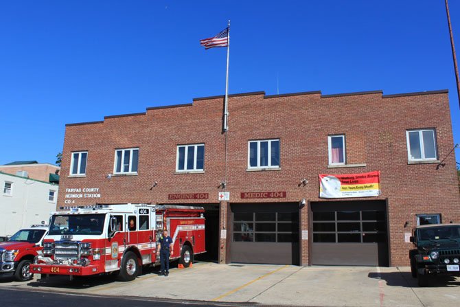 Herndon Fire Apparatus technician Brian Bonkoski shows off the station’s fire truck. The station will be replaced with a state-of-the-art station by 2016.
