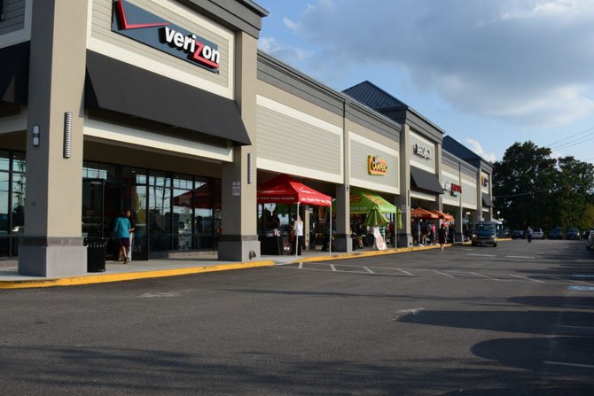 Fordson Place Shopping Center shops offered discounts and giveaways at its grand opening.
