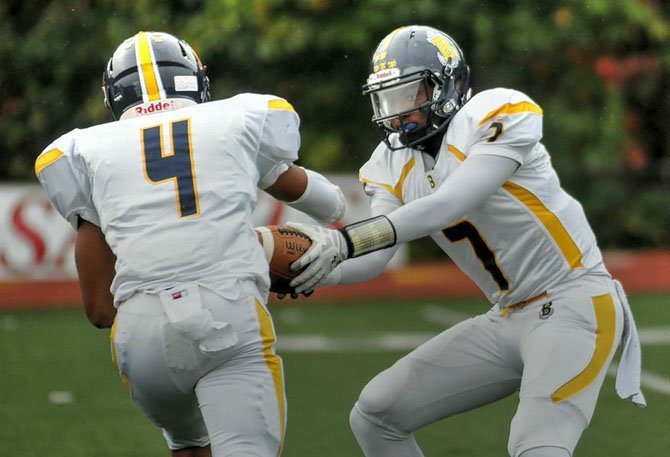 Bullis quarterback Dwayne Haskins Jr., right, threw two touchdown passes against St. Stephen’s & St. Agnes on Oct. 10.