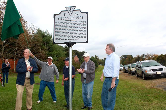 Some of the Hunter Mill Defense League executive members unveil the historic marker on Oct. 11.
