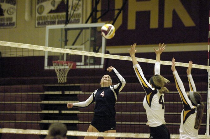 Five-foot-6 Woodson senior Mackenzie Reed made the transition from libero to outside hitter as a junior.